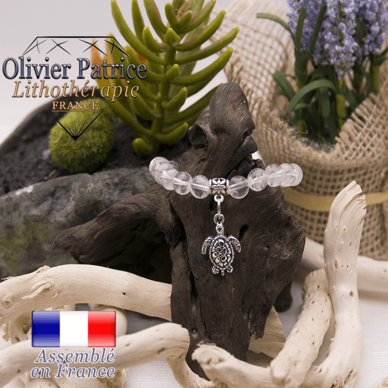 Bracelet cristal de roche et son charms tortue en alliage
