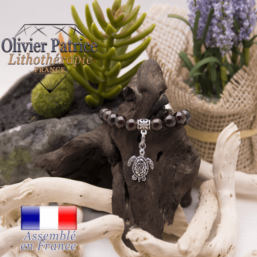 Bracelet grenat et son charms tortue en alliage