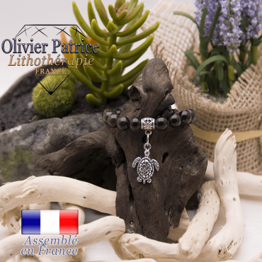 Bracelet obsidienne dorée et son charms tortue en alliage