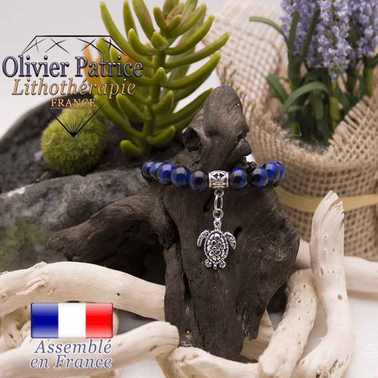 Bracelet Œil de Tigre teinte bleue et son charms tortue