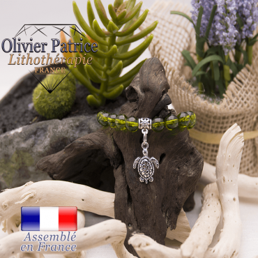 Bracelet péridot et son charms tortue en alliage
