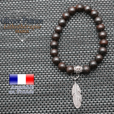 Bracelet en oeil de fer et sa plume en alliage