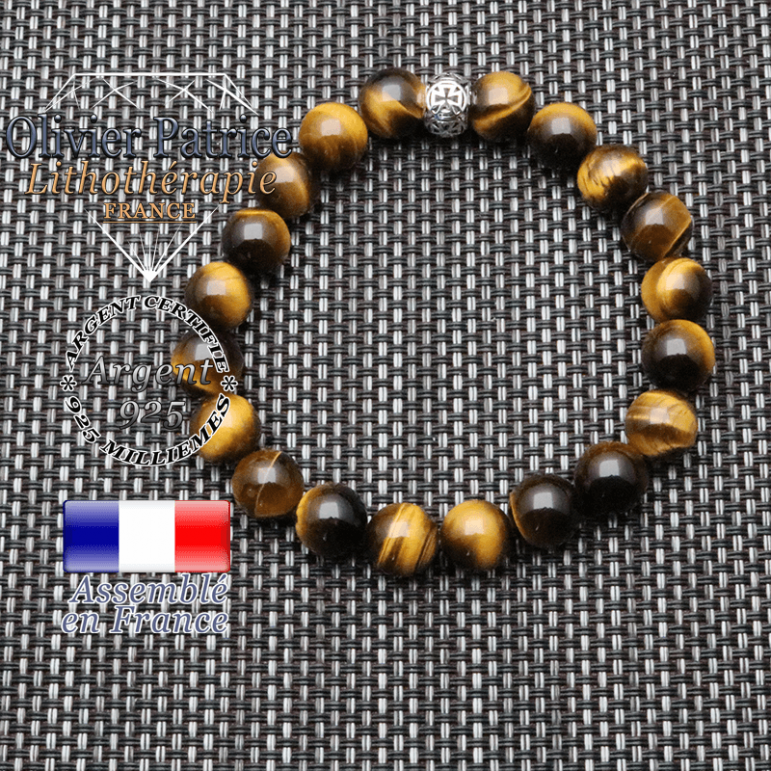 bracelet homme en pierre naturelle en oeil de tigre de 10mm et sa tete de mort en argent 925 de 10mm
