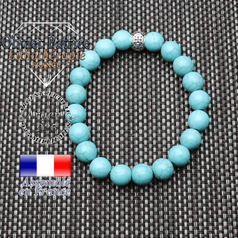 bracelet homme en pierre naturelle en truquoise de 10mm et sa tete de mort en argent 925 de 10mm