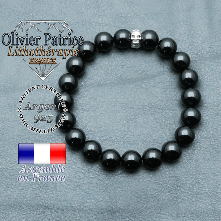 bracelet homme en pierre naturelle en onyx de 10mm et sa tete de mort en argent 925 de 10mm